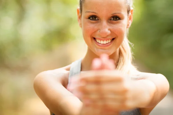 Portrait of gorgeous blond woman doing stretching exercises — Stock Photo, Image