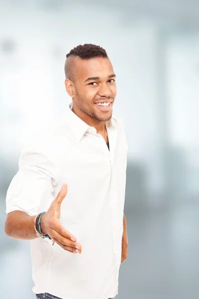 Afro american man is offering the hand for agreement — Stock Photo, Image