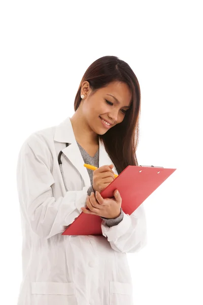 Uśmiechający się azjatycki lekarz z wykresu w jej ręce — Zdjęcie stockowe