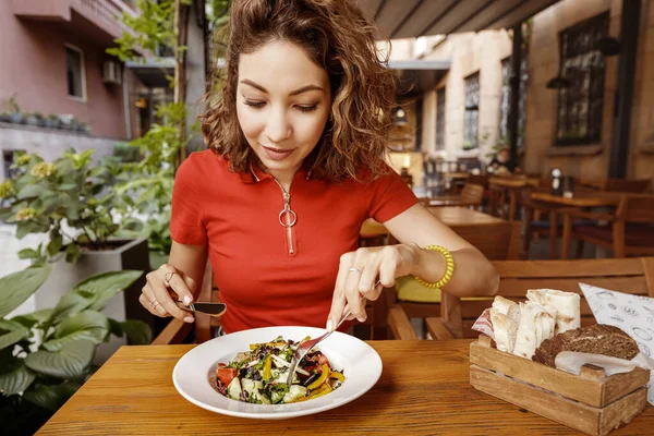 Asian Woman Eating Tasty Healthy Greek Salad Restaurant — Stock Photo, Image