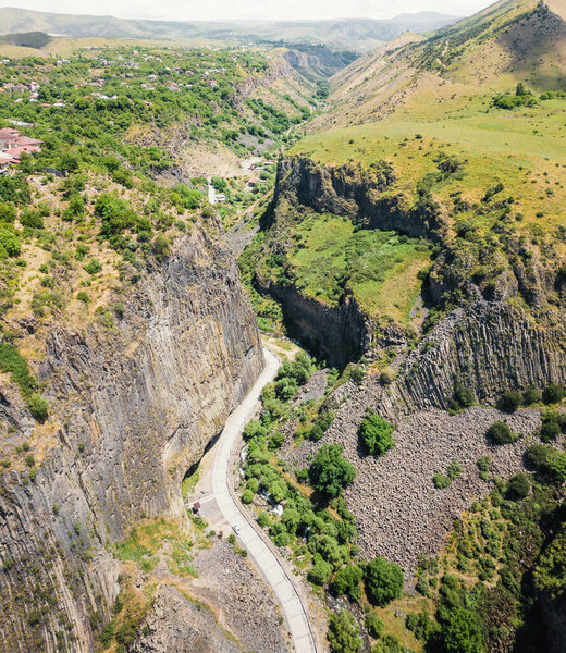 Aerial view of the natural wonder of Armenia - majestic gorge of Azat river canyon - a Symphony of Stones or basalt Pillars in Garni
