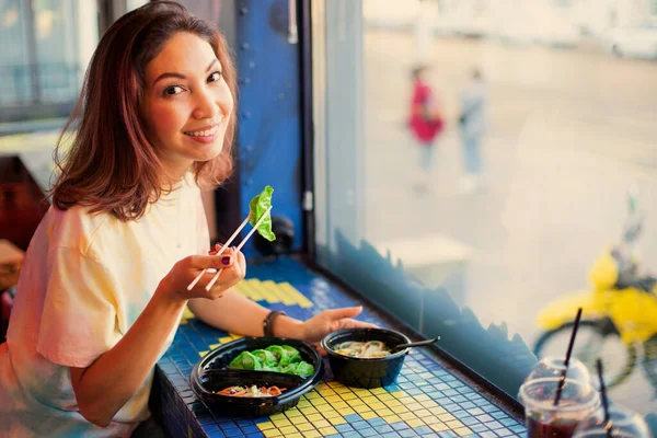 Smiling Asian Woman Eating Japanese Vegetarian Green Dumplings Jiaozi Gyoza — Stock Photo, Image