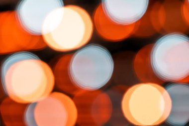 Tasarım için arka plan veya doku olarak Bokeh bulanık ışıklar