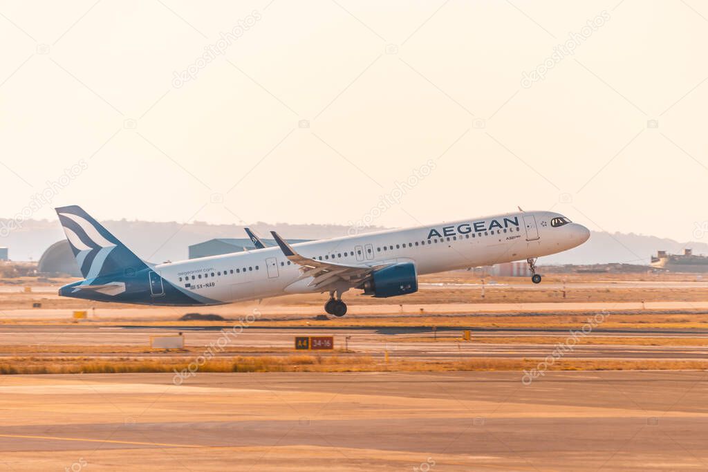 27 October 2021, Thessaloniki, Greece: A regular airplane of Aegan airlines takes off from the runway of Thessaloniki Airport.