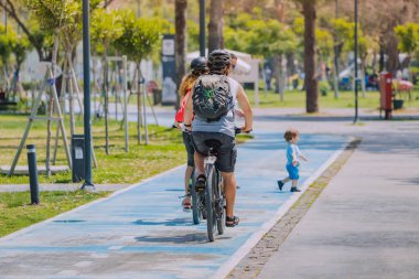 04 June 2022, Antalya, Turkey: The child ran out onto the bike path and created a dangerous and emergency situation