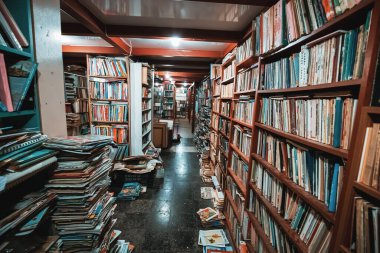 21 June 2022, Antalya, Turkey: Books and textbooks in Turkish language on the shelves of a library or bookstore. Reading and education concept