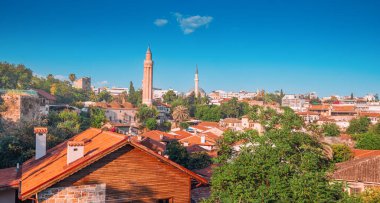Yivli or flute minaret mosque is a religious symbol and travel landmark of Antalya resort town in Turkey. Attractions and destinations in Kaleice old town