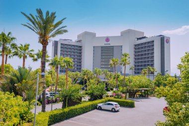 23 June 2022, Antalya, Turkey: Akra hotel logo at the entrance to luxury tourism accommodation appartments. Hospitality business trends and companies