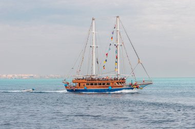 09 January 2022, Hurghada, Egypt: Cruise pirate ship in a resort town in Africa