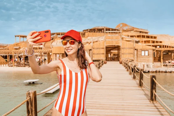 Happy Girl Swimsuit Takes Photos Her Smartphone Resort Town Vacation — Foto de Stock