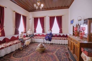 09 July 2022, Antalya, Turkey: Historical exhibition depicting an everyday life of ottoman and turkish noble family in traditional interiors in museum