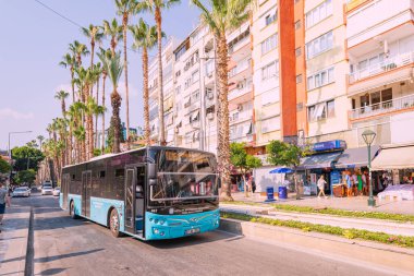 09 July 2022, Antalya, Turkey: Urban public transport bus with passengers on their routes. Rush hour and street traffic jams concept