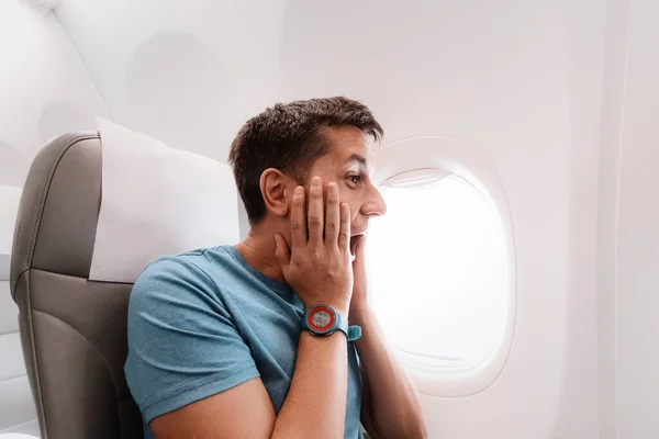 Young Man Afraid Fly Airplane Emotionally Screams Fear Panic Attack — Stock Photo, Image