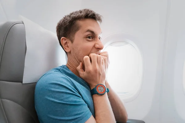 Young Man Afraid Fly Airplane Emotionally Screams Fear Panic Attack — Stock Photo, Image