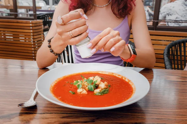 Woman Adds Salt Saltcellar Soup Restaurant Overabundance Consumption Seasoning Can — Stock Photo, Image