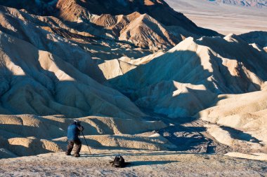 Photographer at Death Valley Badlands clipart