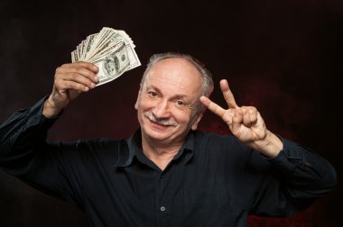 Old man with dollar bills