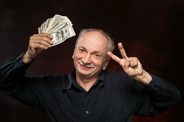 Old man with dollar bills — Stock Photo, Image