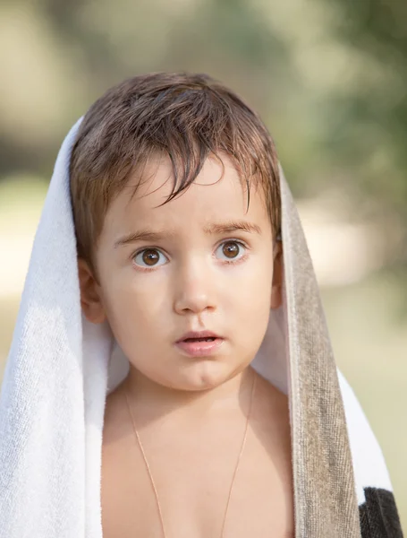 Three year old boy with a serious expression — Stock Photo, Image