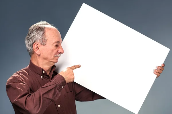 Man anläggningen billboard — Stockfoto