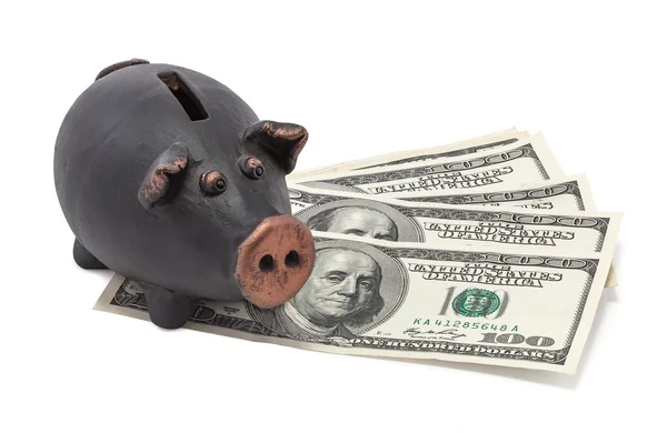 Money and black piggy bank — Stock Photo, Image