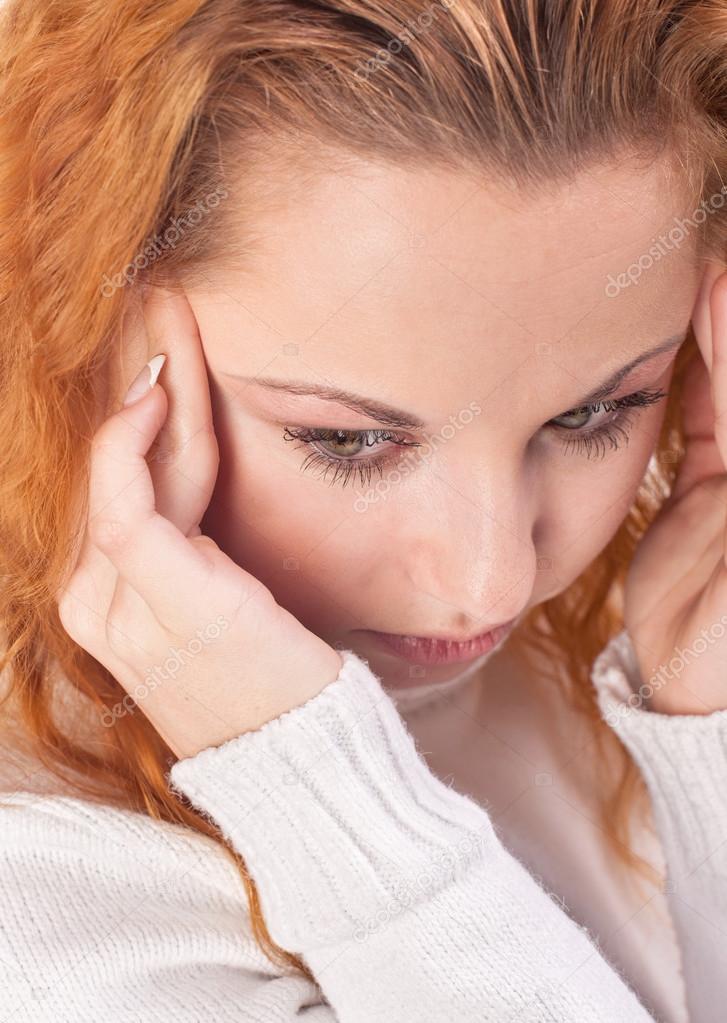 Woman suffering from headache