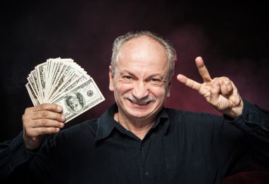 Old man with dollar bills