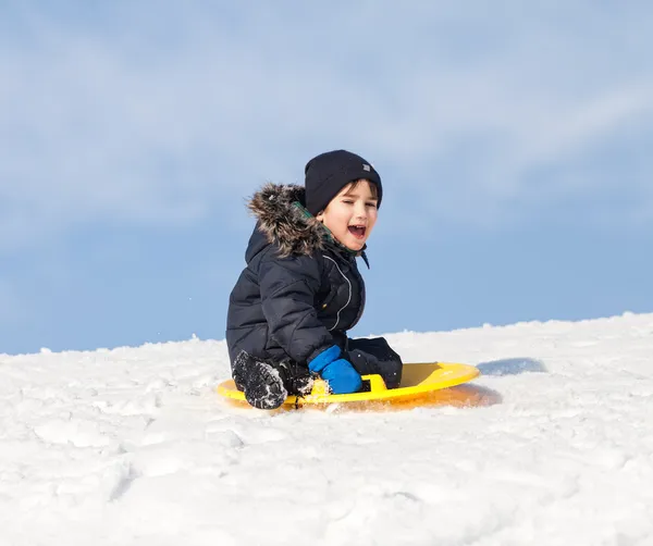 Sledding at winter time — Stock Photo, Image