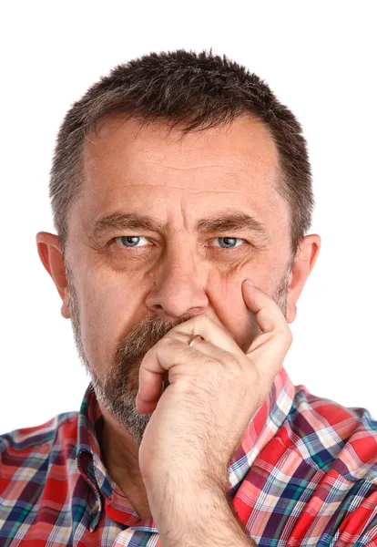 Thoughtful elderly man with hand near the face — Stock Photo, Image