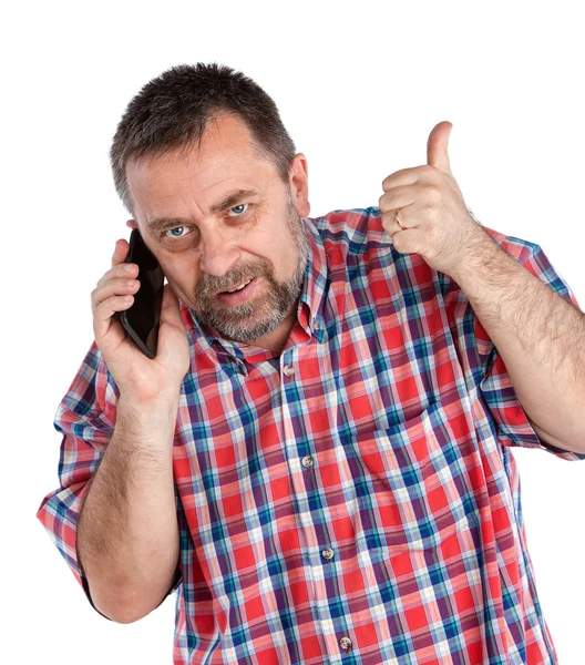 Uomo di mezza età parla su un telefono cellulare — Foto Stock