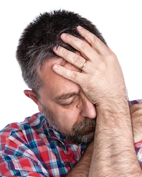 Чоловік середнього віку страждає від головного болю — стокове фото