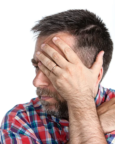 Muž středního věku trpí bolest hlavy — Stock fotografie