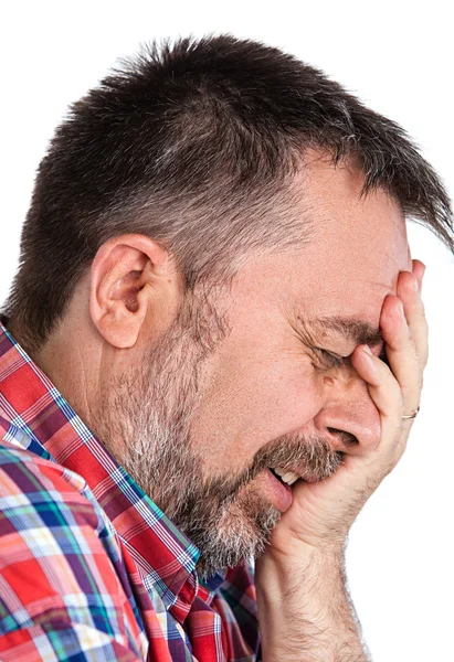 Oudere man lijdt aan een hoofdpijn — Stockfoto