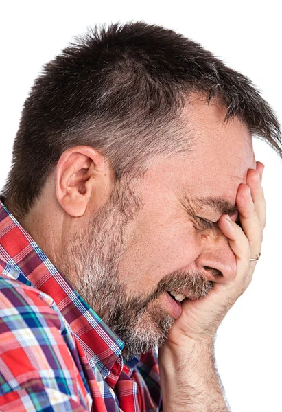 Elderly man suffering from a headache Stock Photo