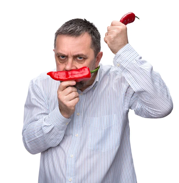 Un hombre con un pimiento rojo — Foto de Stock