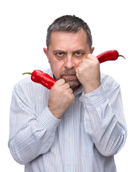 Ένας άνθρωπος με μια κόκκινη πιπεριά — Φωτογραφία Αρχείου