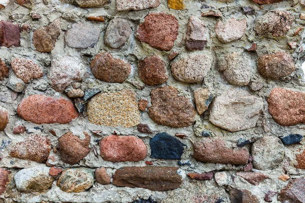 Taş ve beton duvar arka yıpranmış — Stok fotoğraf