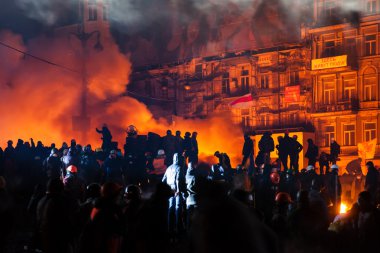 KIEV, UKRAINE - January 24, 2014: Mass anti-government protests clipart