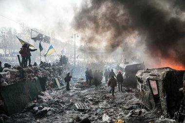 KIEV, UKRAINE - January 25, 2014: Mass anti-government protests clipart