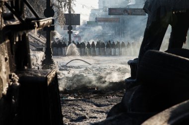 KIEV, UKRAINE - January 26, 2014: Mass anti-government protests clipart