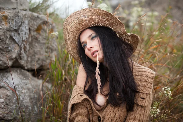 Girl against background of nature and old stones — Stock Photo, Image