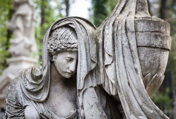 Statue on grave in the old cemetery — Stock Photo, Image