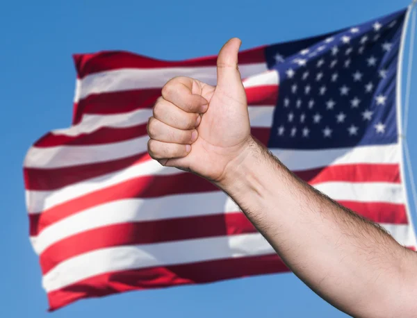 Tumb teken tegen van usa vlag — Stockfoto