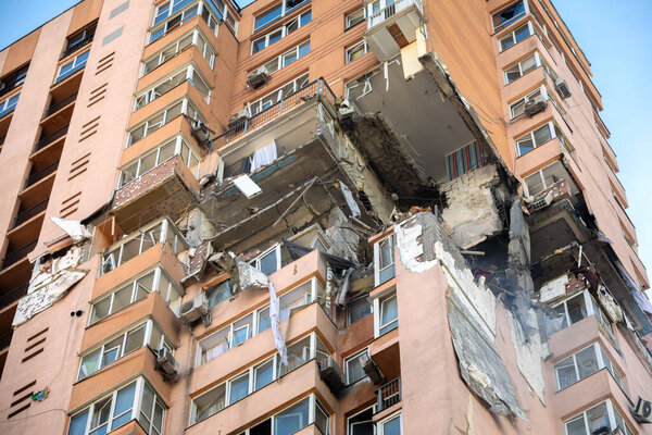 KYIV, UKRAINE - Feb. 25, 2022: War of Russia against Ukraine. View of a civilian building damaged following a Russian rocket attack the city of Kyiv, Ukraine