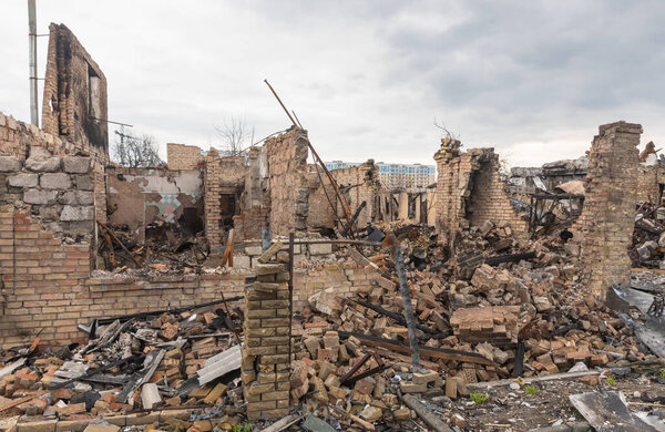 BUCHA, UKRAINE - Apr. 06, 2022: War in Ukraine. Chaos and devastation on the streets of Bucha as a result of the attack of Russian invaders