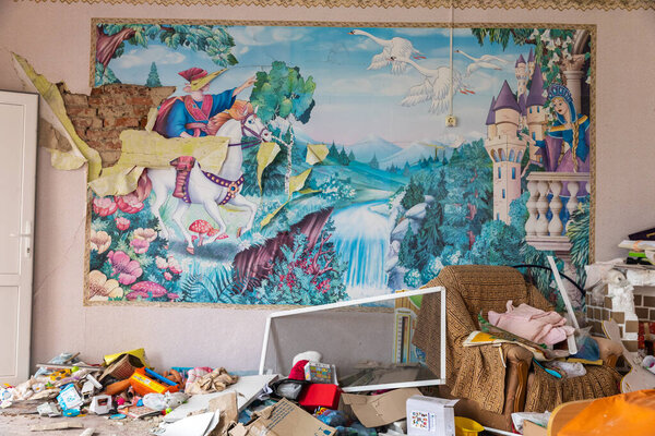 MAKARIV, UKRAINE - Apr. 23, 2022: Destroyed kindergarten as a result of the invasion of Ukraine by the Russian occupation forces. Russians throw air bomb on it at night on March 26