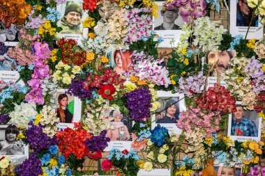 LVIV, UKRAINE - Jun. 08, 2022: A Wall of Memory has appeared in the center of Lviv in honor of the Ukrainians who died (and not only) in the war waged against us by Russia.