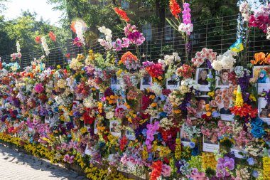 LVIV, UKRAINE - Jun. 08, 2022: A Wall of Memory has appeared in the center of Lviv in honor of the Ukrainians who died (and not only) in the war waged against us by Russia.