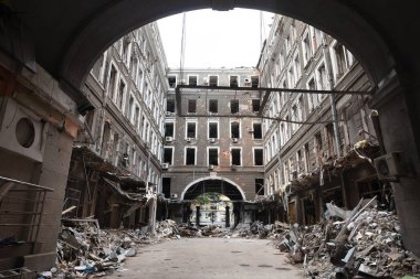 KHARKIV, UKRAINE - Aug. 01, 2022: Destroyed building in historical downtown as a consequences of Russian shelling in Kharkiv. War of Russia against Ukraine