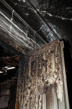 KHARKIV, UKRAINE - Aug. 01, 2022: Burnt and damaged city hospital in the historical building in Kharkiv. Destroyed building in historical downtown as a consequences of Russian shelling in Kharkiv